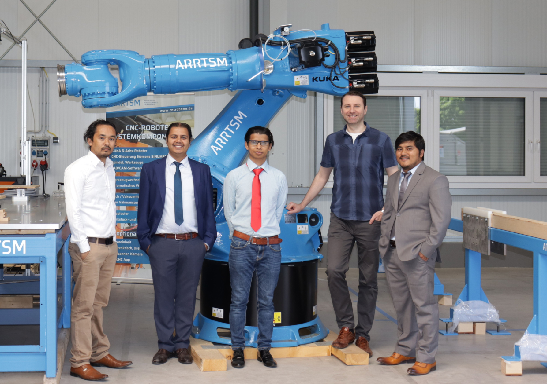 ARRTSM team with industrial robot